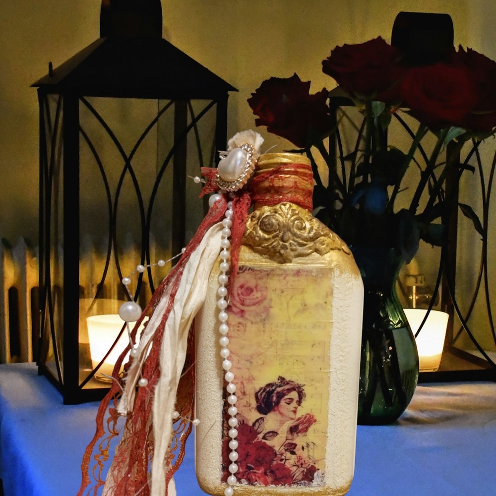 Decorative Vintage-Style Bottle with Gold and Red Accents